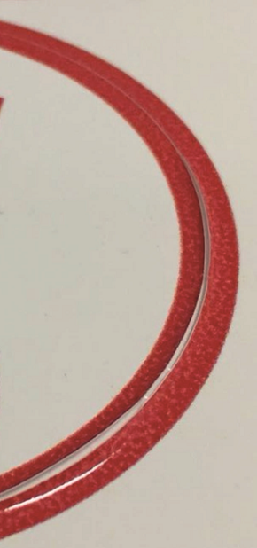 Esempio di taglio del vinile adesivo con sovradosaggio di inchiostro